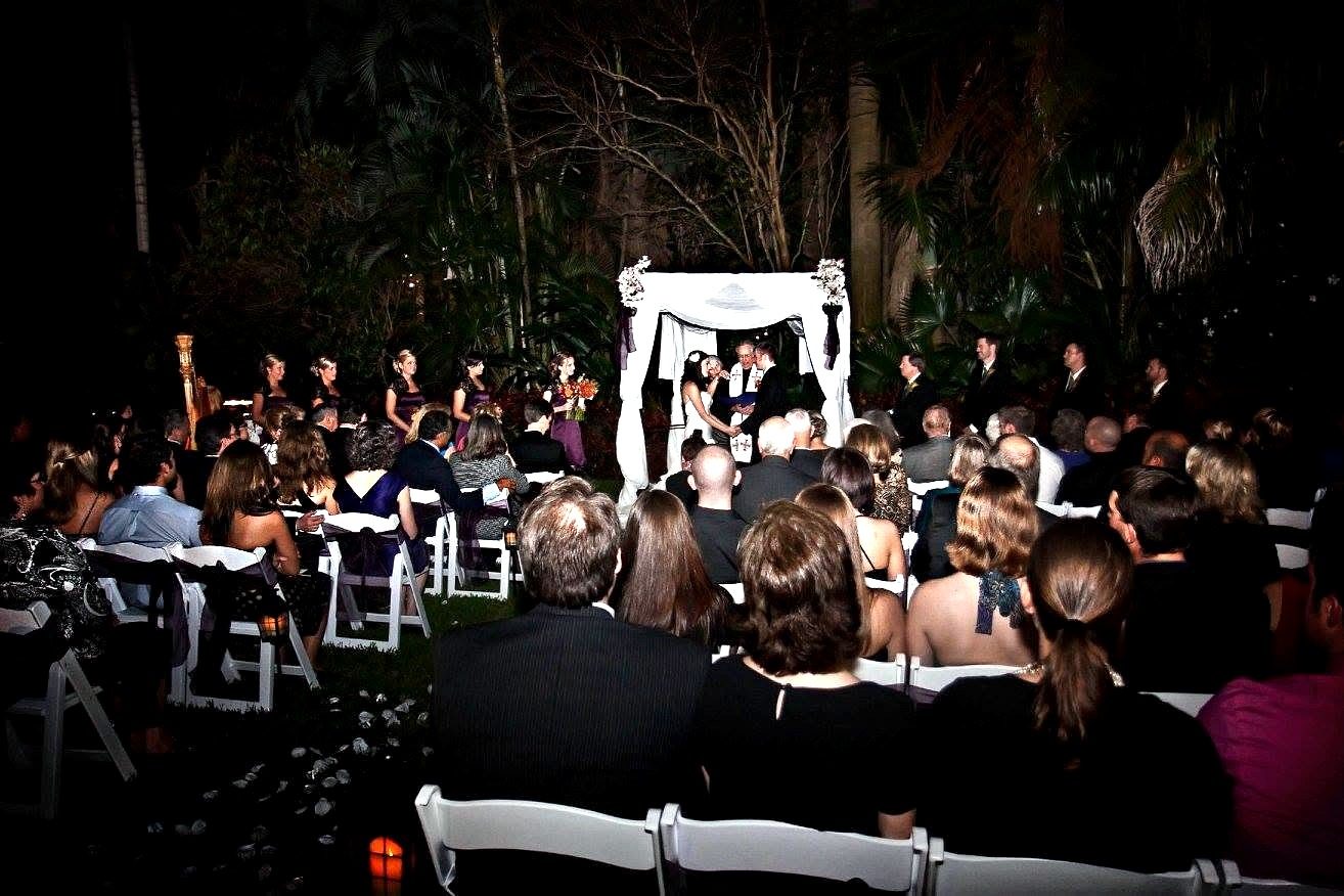 Entryway / arch decor — a draped ceremony arch at dusk, by Altitude Event Design and Decor, Tampa Bay